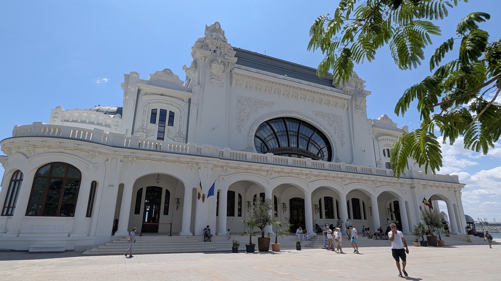 The Casino's main façade after restoration, with the large arched window, the ground-floor arcades and the esplanade in front